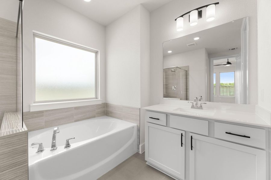 Representative furnished interior of a home built from the Hazel by Tri Pointe Homes in Treeline, Justin (Image 11).