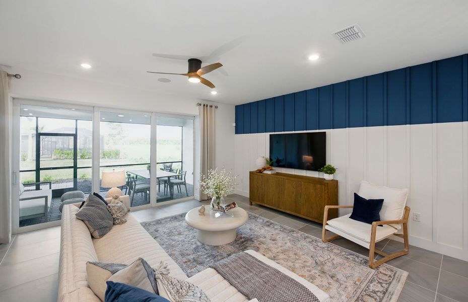 Gathering Room with sliding glass doors to the covered lanai Gathering Room with sliding glass doors to the covered lanai