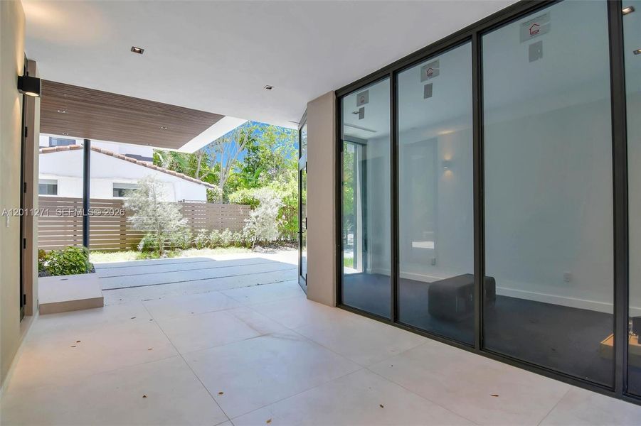 Exterior details and patio area of a home in , Miami (Image 37).