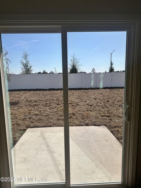 Exterior details and patio area of a home in Rookery, Green Cove Springs (Image 2).