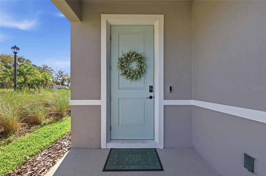 Exterior details and patio area of a home in Lakewood Park, Deland (Image 3).