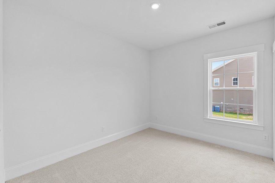 Spacious, unfurnished interior of a new home in Lilah Grove, Summerfield (Image 38).