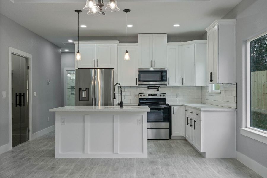 Furnished interior view inside a new home in , Willis (Image 8).