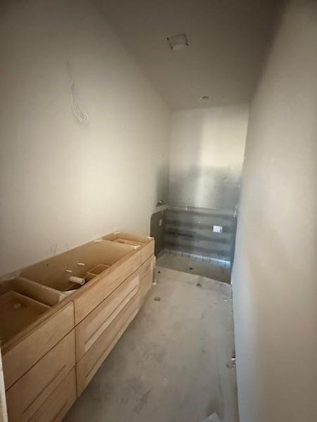 Guest bathroom with shower. The left side wall will be completely tiled with upgraded tile for a designer look.