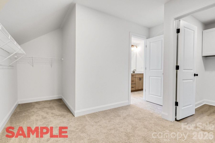 Primary Closet with access to Laundry