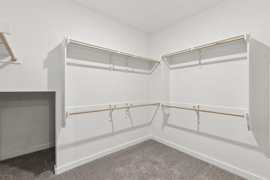 Primary Closet in the Winters home plan by Trophy Signature Homes – REPRESENTATIVE PHOTO Primary Closet in the Winters home plan by Trophy Signature Homes – REPRESENTATIVE PHOTO