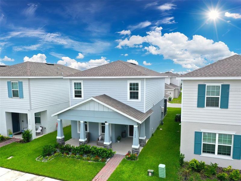 Front exterior of a new home in , Apopka, FL, highlighting curb appeal (Image 1). Front exterior of a new home in , Apopka, FL, highlighting curb appeal (Image 1).