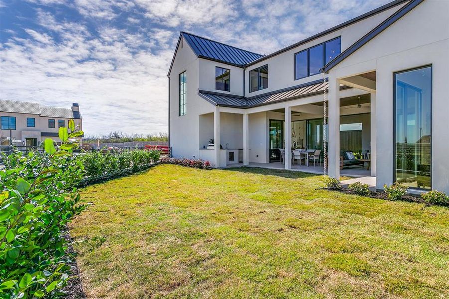 Exterior details and patio area of a home in Avadene at Las Colinas, Irving (Image 4).