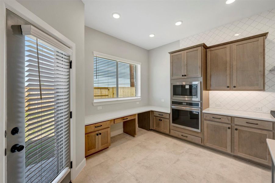 Furnished interior view inside a new home in Meridiana 55' Homesites, Manvel (Image 10).