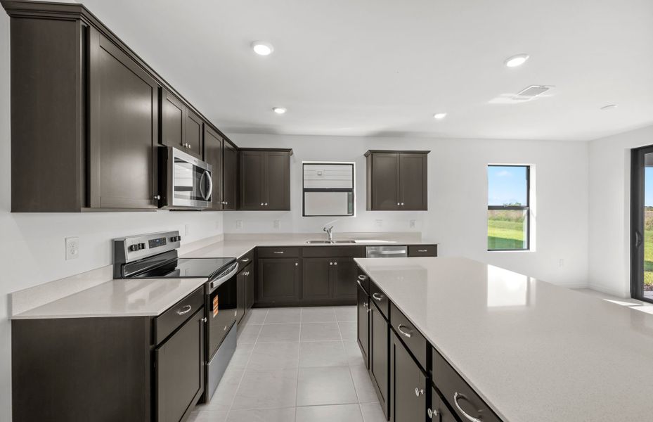 Furnished interior view inside a new home in Whispering Lakes, Lehigh Acres (Image 36).