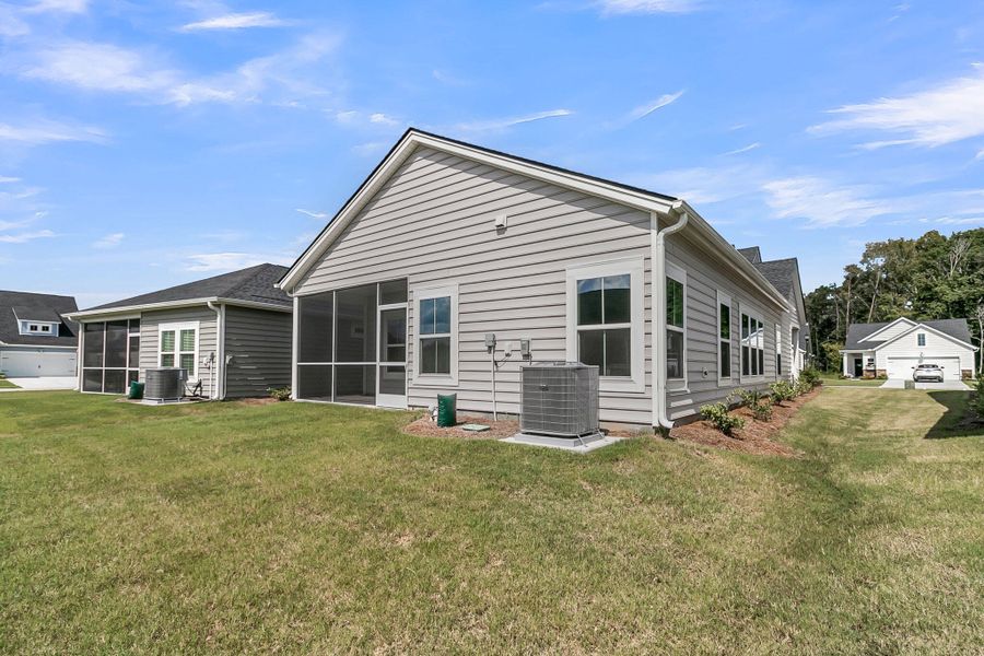 Front exterior of a new home in Horizons at Summers Corner | 55+: The Cottages, Summerville, SC, highlighting curb appeal (Image 28). Front exterior of a new home in Horizons at Summers Corner | 55+: The Cottages, Summerville, SC, highlighting curb appeal (Image 28).