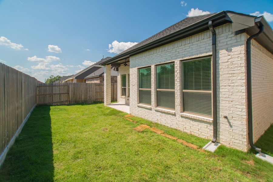 Front exterior of a new home in , Conroe, TX, highlighting curb appeal (Image 18). Front exterior of a new home in , Conroe, TX, highlighting curb appeal (Image 18).