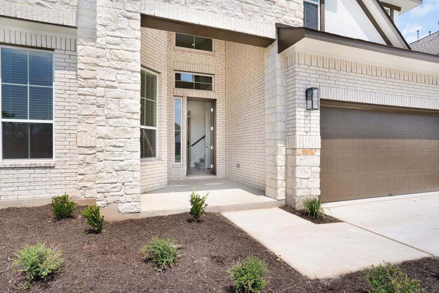 Exterior details and patio area of a home in The Grove at Blackhawk, Pflugerville (Image 22).