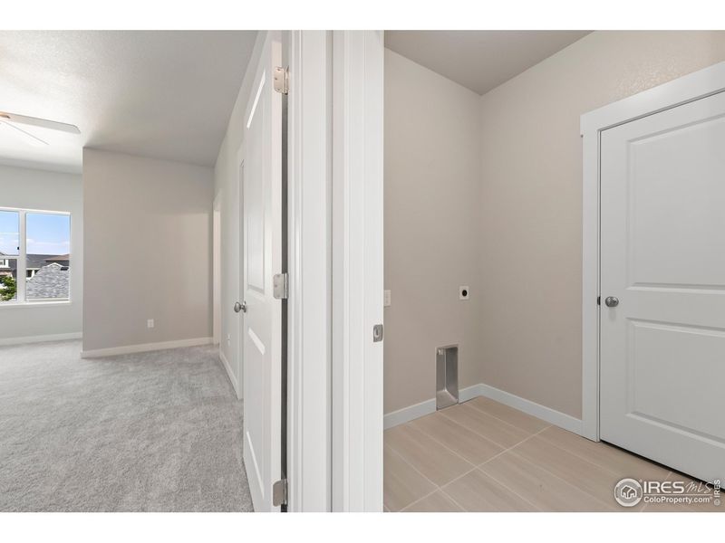 Spacious, unfurnished interior of a new home in The Lakes at Centerra - Discovery, Loveland (Image 19).