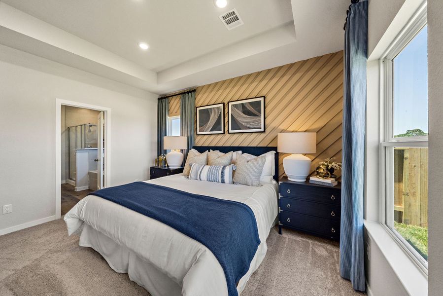 A bedroom with two beds.