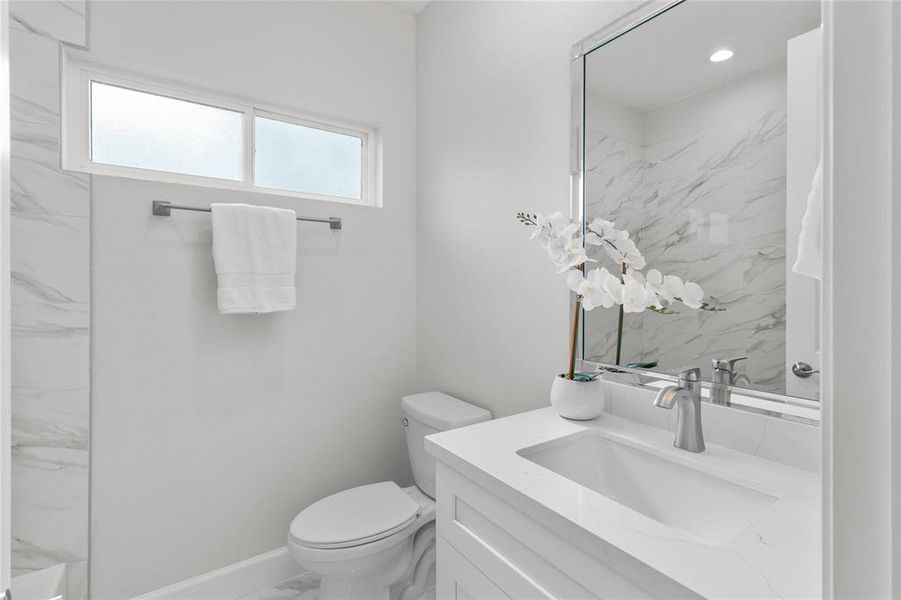 Modern and stylish bathrooms with high-end finishes throughout.