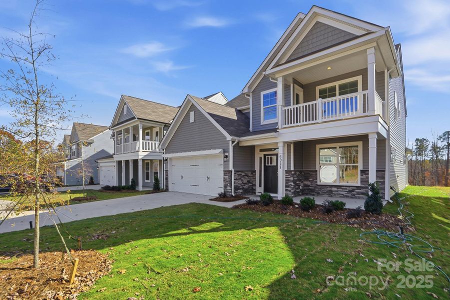 Front exterior of a new home in Grier Meadows, Charlotte, NC, highlighting curb appeal (Image 22).