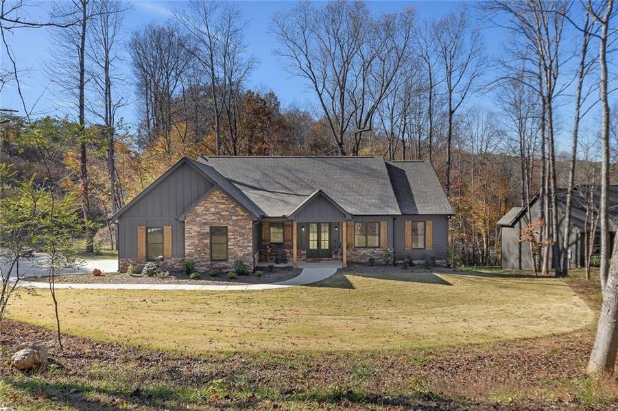 Front exterior of a new home in , Talking Rock, GA, highlighting curb appeal (Image 1).