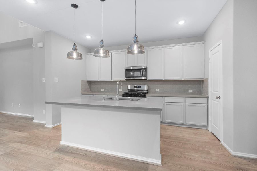 Furnished interior view inside a new home in Bridgeland 40', Cypress (Image 9). Furnished interior view inside a new home in Bridgeland 40', Cypress (Image 9).