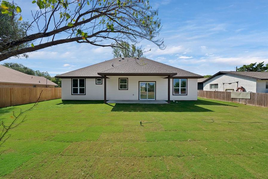 Front exterior of a new home in , Runaway Bay, TX, highlighting curb appeal (Image 2). Front exterior of a new home in , Runaway Bay, TX, highlighting curb appeal (Image 2).