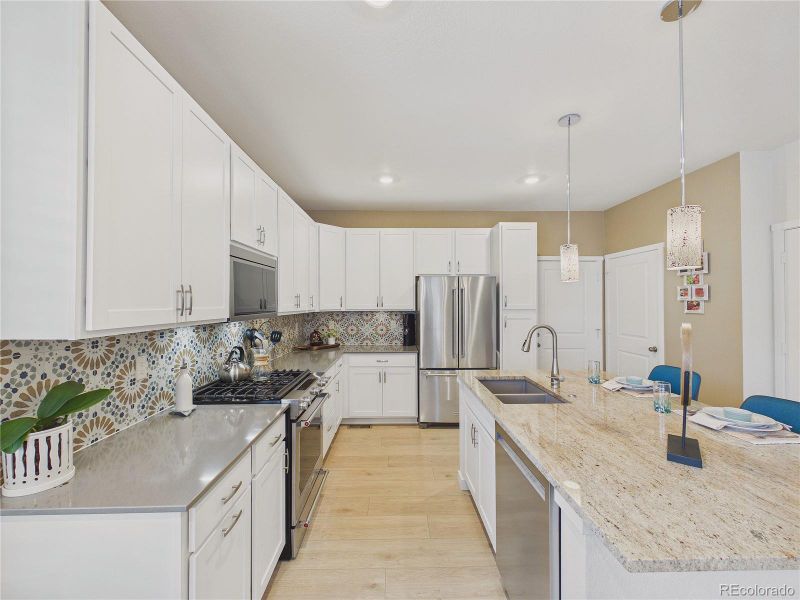 Furnished interior view inside a new home in Whisper Village, Arvada (Image 15).