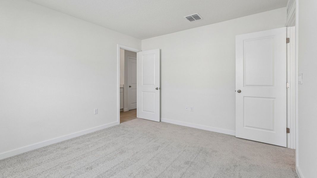 Furnished interior view inside a new home in Cyrene at Harmony, St. Cloud (Image 29).