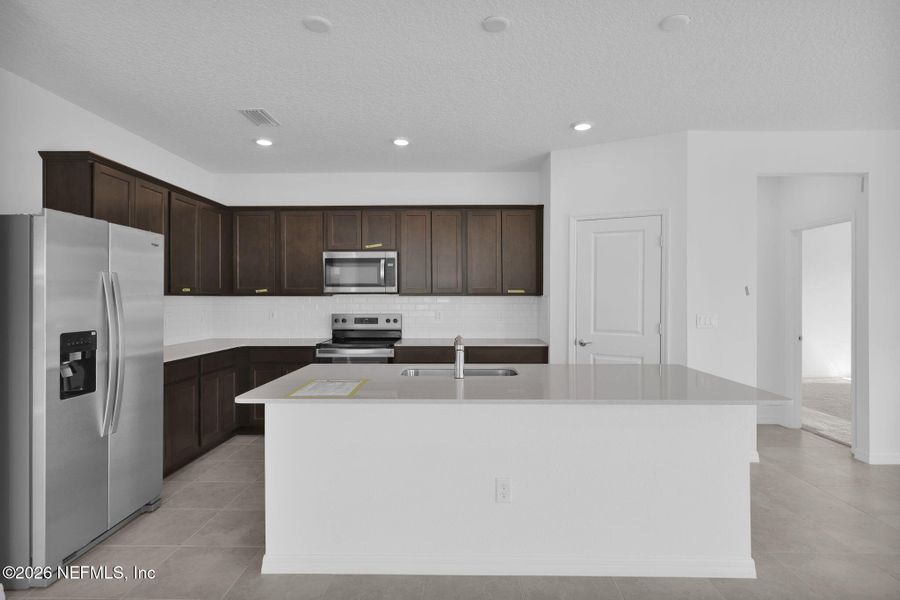 Furnished interior view inside a new home in Hyland Trail, Green Cove Springs (Image 7). Furnished interior view inside a new home in Hyland Trail, Green Cove Springs (Image 7).