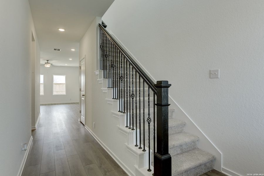 Spacious, unfurnished interior of a new home in Hennersby Hollow, San Antonio (Image 18).