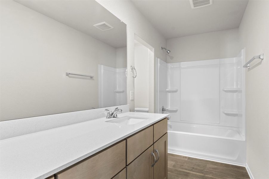 Furnished interior view inside a new home in Edgebrooke, Pflugerville (Image 19). Furnished interior view inside a new home in Edgebrooke, Pflugerville (Image 19).