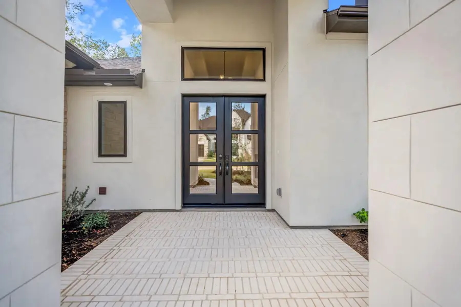 Exterior details and patio area of a home in The Woodlands Hills, Willis (Image 3). Exterior details and patio area of a home in The Woodlands Hills, Willis (Image 3).