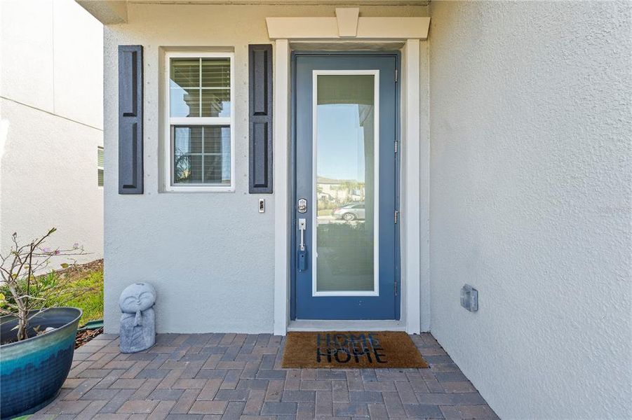 Exterior details and patio area of a home in Bryant Square: The Manors, New Port Richey (Image 28).