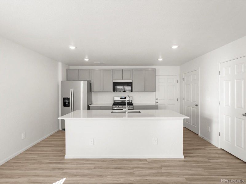 Furnished interior view inside a new home in Skyview at High Point, Aurora (Image 9).