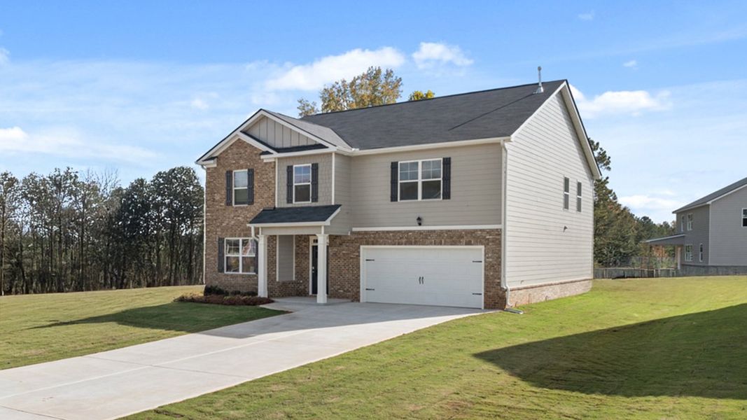 Front exterior of a new home in Bridle Creek, Locust Grove, GA, highlighting curb appeal (Image 2).