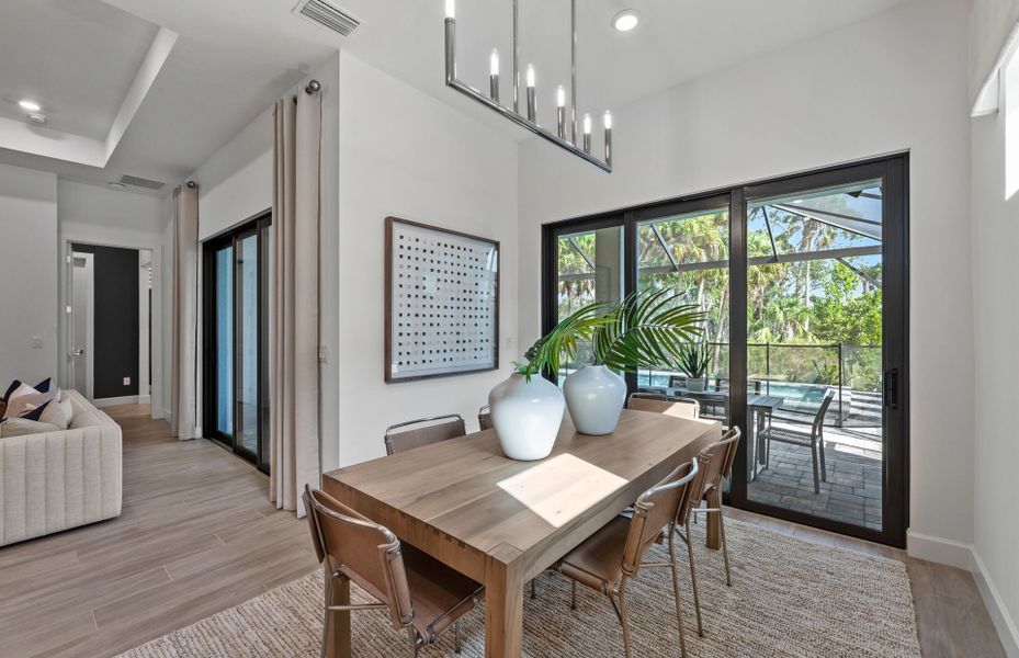 Café dining space with sliding glass door to lanai
