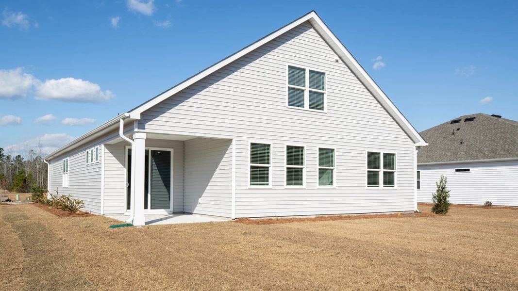 Exterior details and patio area of a home in Indigo Preserve, Leland (Image 3).