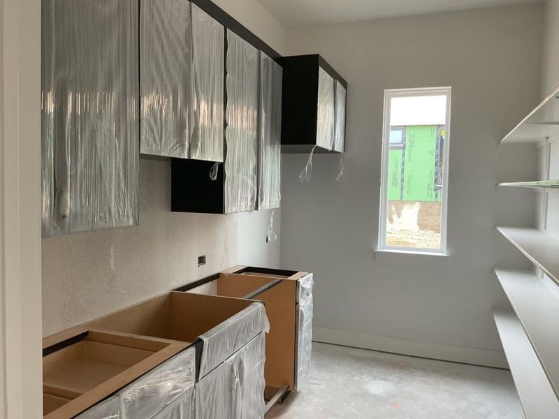 Kitchen with concrete flooring