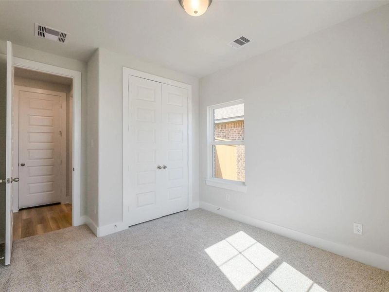 Spacious, unfurnished interior of a new home in Sunterra, Katy (Image 33).