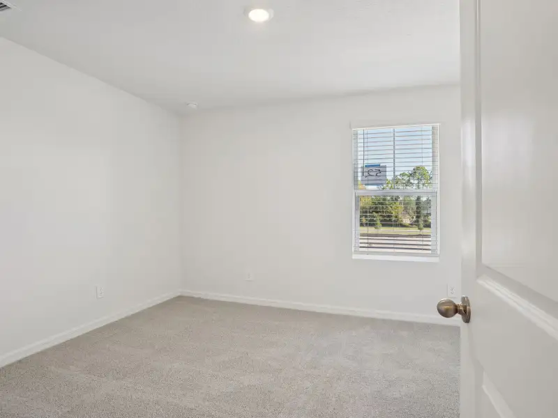Spacious, unfurnished interior of a new home in The Meadow at Crossprairie Townes, St. Cloud (Image 12).