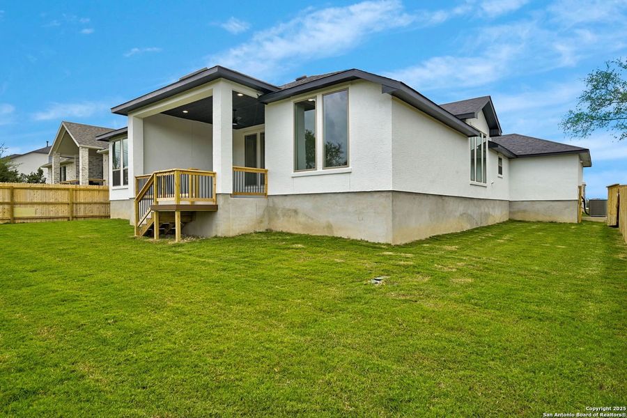 Exterior details and patio area of a home in Kinder Ranch 70's, San Antonio (Image 2).