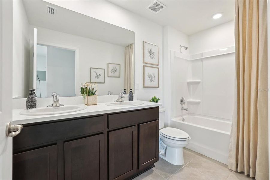 Furnished interior view inside a new home in Sherman Oaks, Brooksville (Image 24). Furnished interior view inside a new home in Sherman Oaks, Brooksville (Image 24).