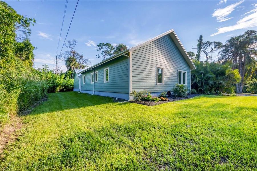 Front exterior of a new home in , Englewood, FL, highlighting curb appeal (Image 2).