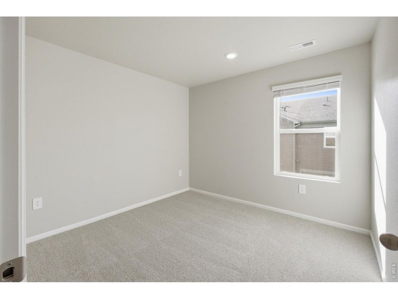 Spacious, unfurnished interior of a new home in Poudre Heights: The Meadow Collection, Windsor (Image 21).