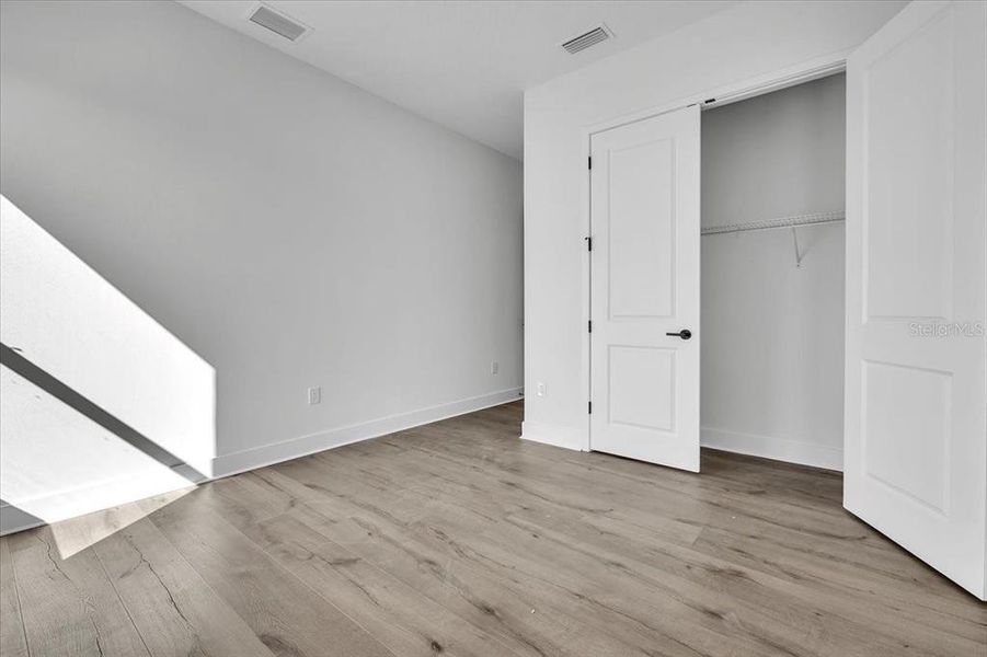 Spacious, unfurnished interior of a new home in Gracewater at Sarasota, Sarasota (Image 22).