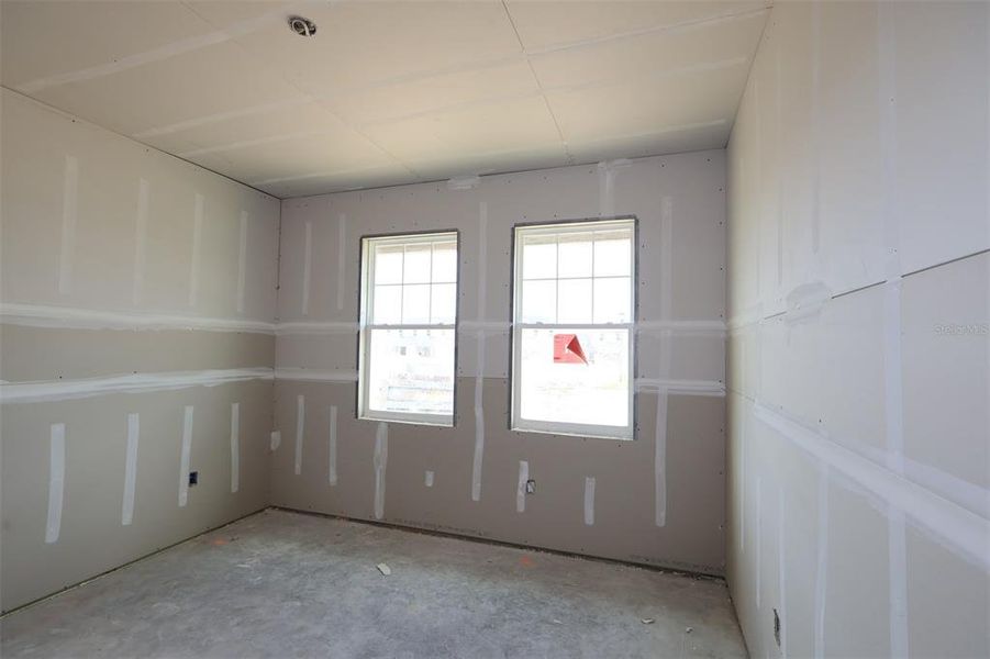 In-progress construction of a new home in Emerson Pointe, Apopka, FL (Image 19).