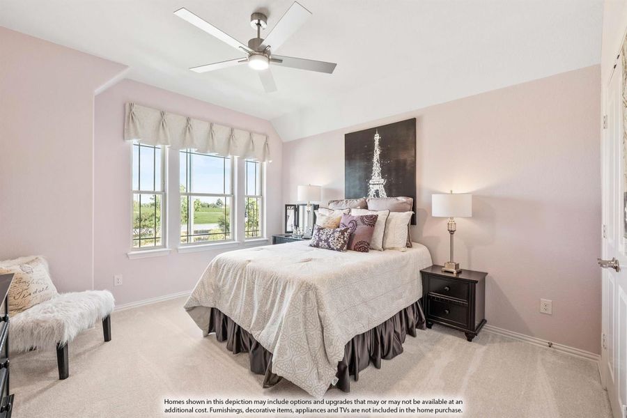 Bedroom with pink walls, vaulted ceiling, ceiling fan, and carpet flooring with large windows