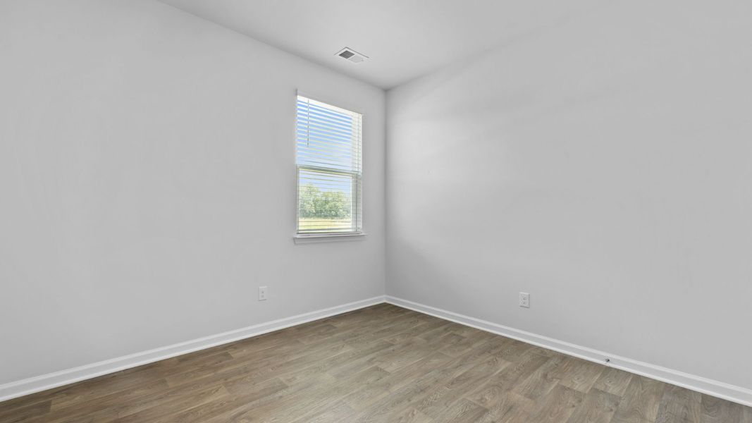 Spacious, unfurnished interior of a new home in Pine Hills at Cane Bay, Summerville (Image 21).