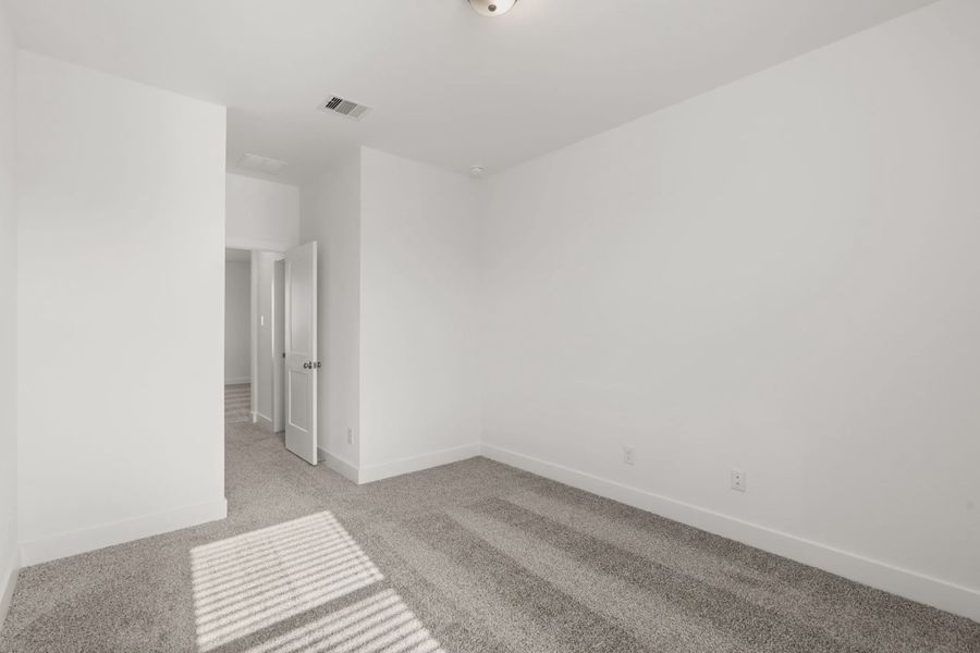 Representative unfurnished interior of a home built from the Macalister by Chesmar Homes in The Trails, New Caney (Image 14). Representative unfurnished interior of a home built from the Macalister by Chesmar Homes in The Trails, New Caney (Image 14).