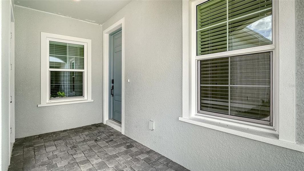 Exterior details and patio area of a home in Windward Real Estate and Homes for Sale in Sarasota, FL - Neal Communities, Lakewood Ranch (Image 19).