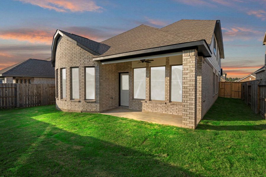 Exterior details and patio area of a home in The Trails, New Caney (Image 4).