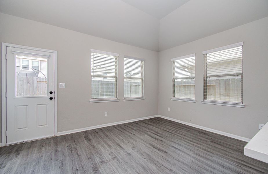 The dining area is an added feature surrounded by windows that provide awesome natural lighting